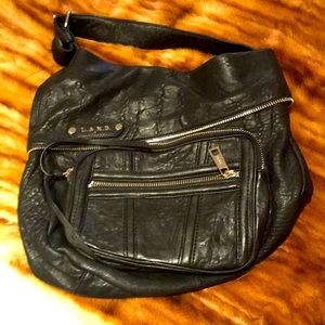 Lamb black leather handbag